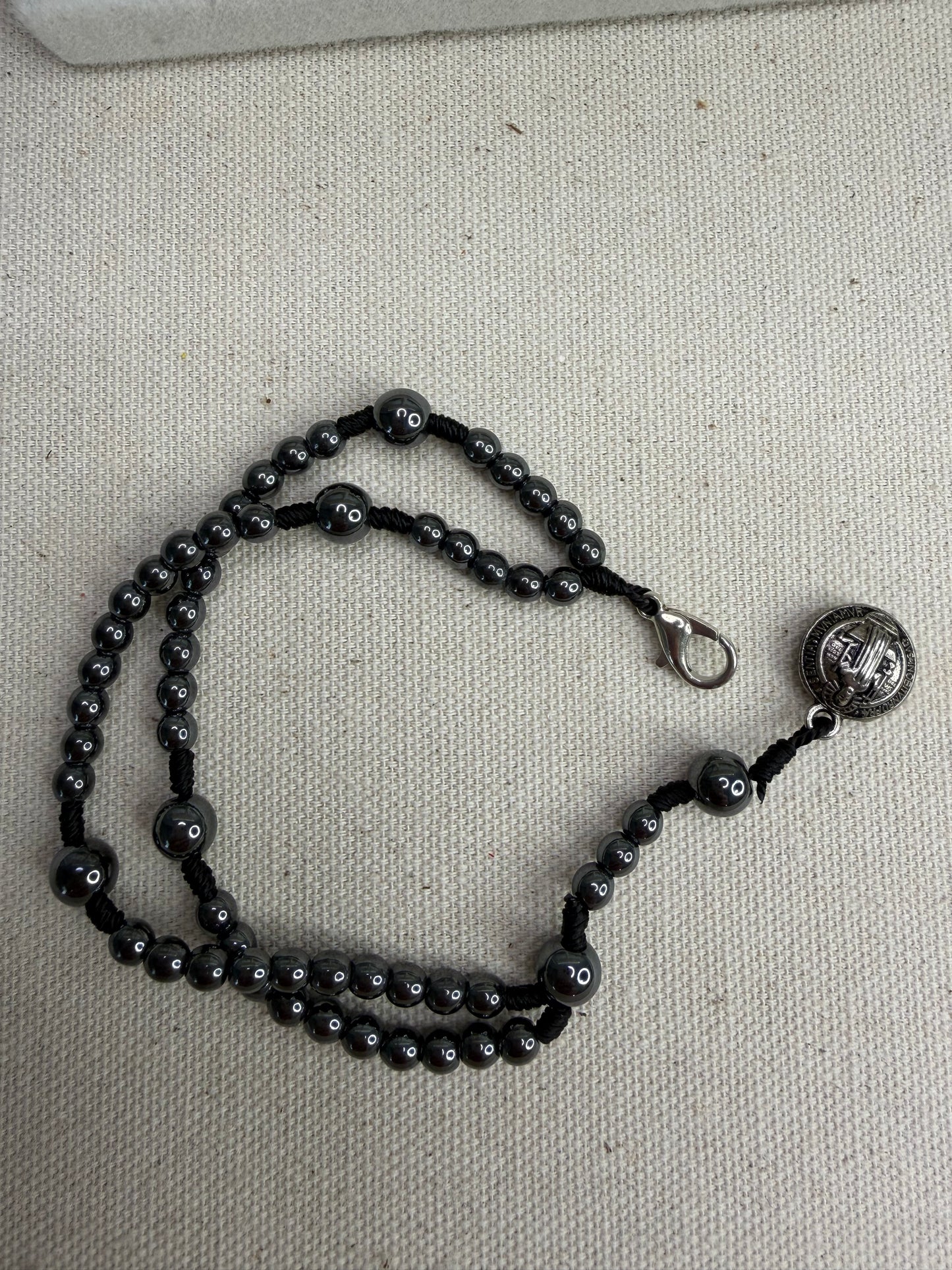 St. Benedict Hematite Rosary Bracelet – Protection, strength, and faith